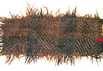 Fragment d'étoffe de laine à carreaux, VIIIe-IIIe siècle avant notre ère, 10,5 x 4 cm. Fouilles Barth, 1966.